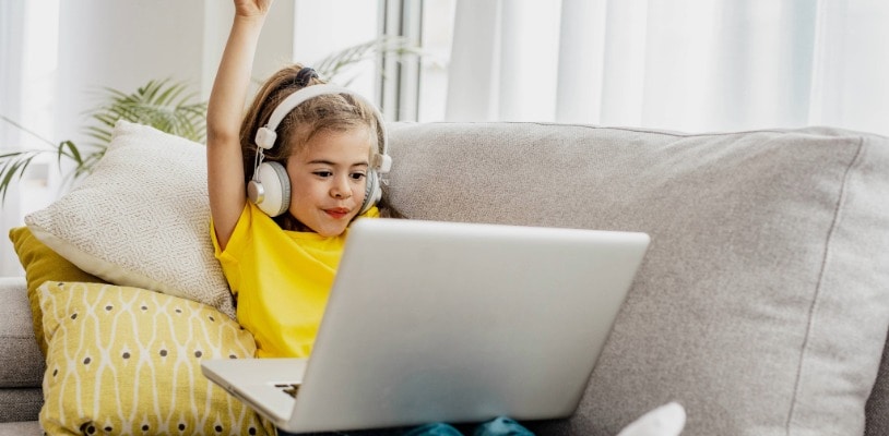 Elementary online private school student working on an online lesson