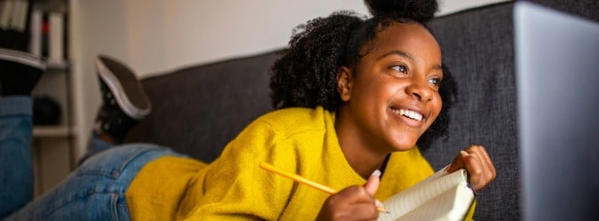 Gifted and advanced private online school student on laptop