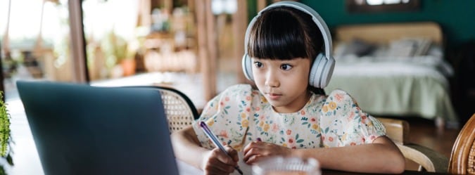 Female high school student completing online course - Pearson Online Academy