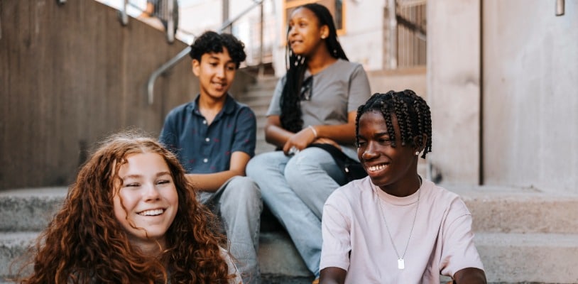 A group of diverse students smiling