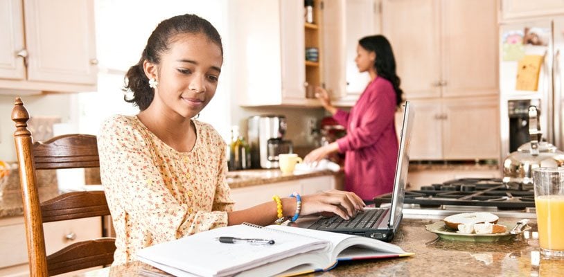 Online middle school student on her laptop