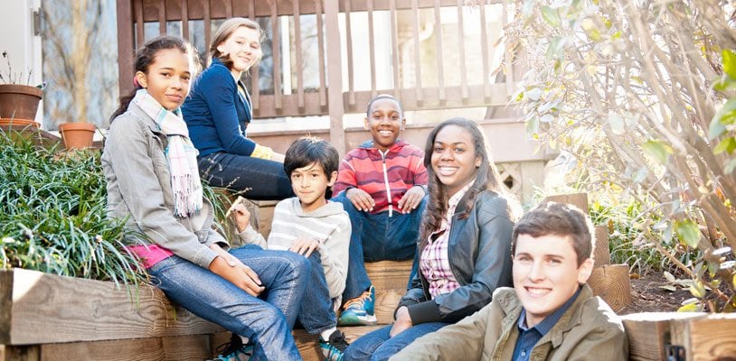 A group of diverse students smiling